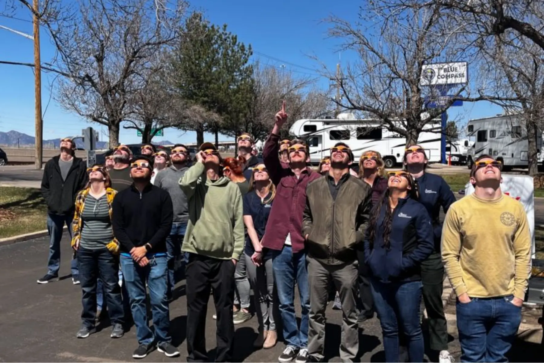 BDC Labs team members viewing a solar eclipse together