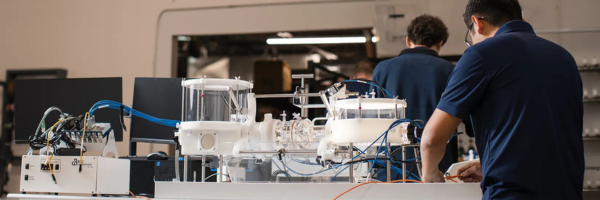 BDC lab workers with equipment